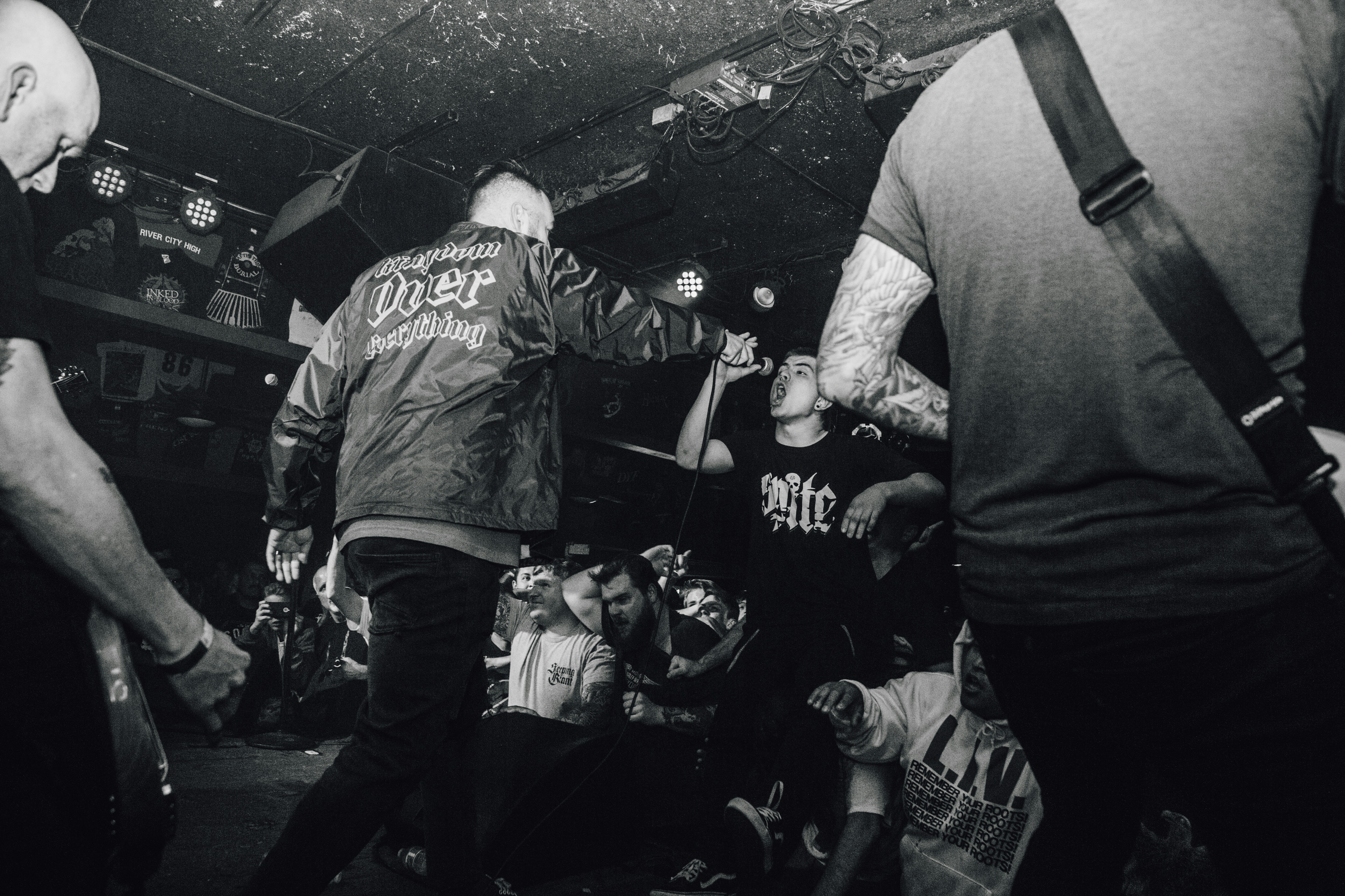 Band members and crowd members clash at the venue